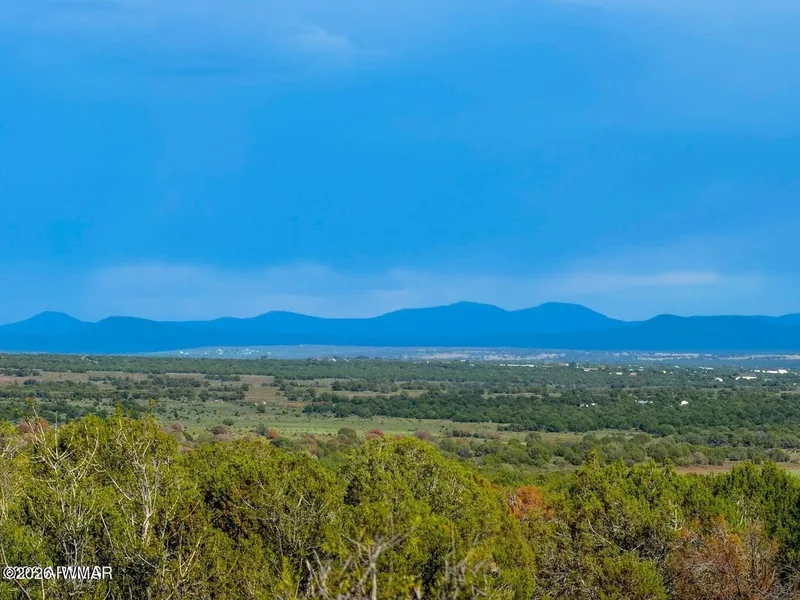 Looking over the juniper flats toward the far ridgeline from the parcel